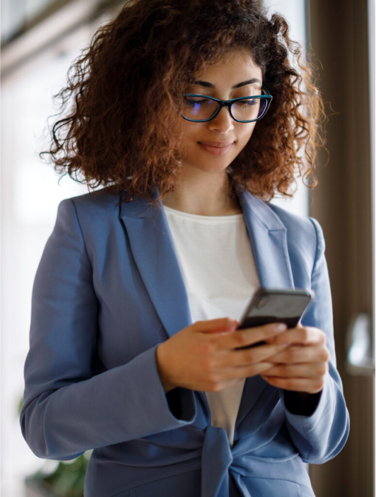 Woman using financial calculator on mobile phone.